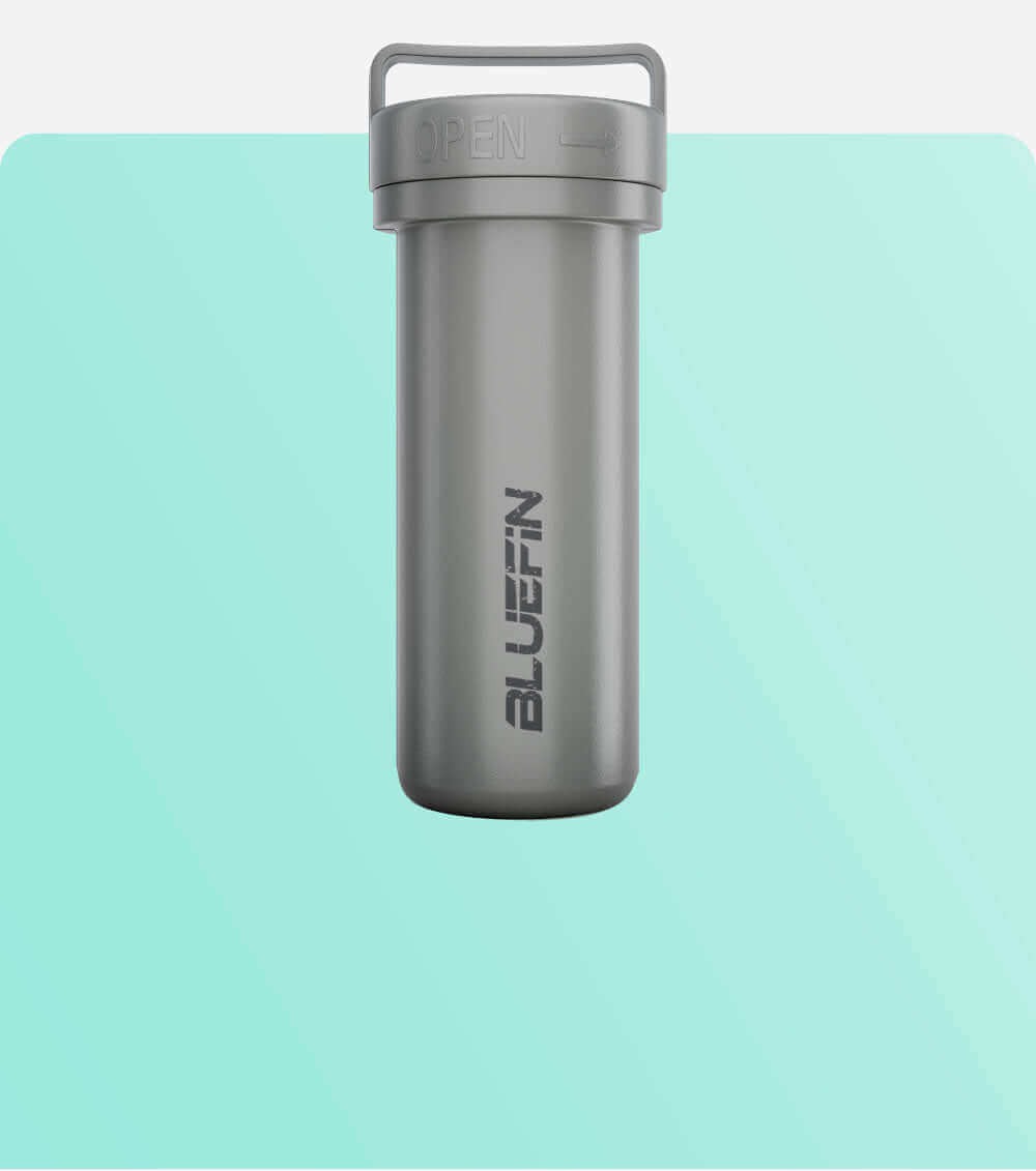 Gray waterproof container with an open lid and the word BLUEFIN printed on the side