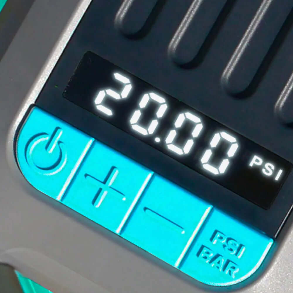 Manómetro digital mostrando 20.00 PSI con botones de control en turquesa y gris.