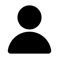 Black silhouette of a person with a circular head and rounded shoulders