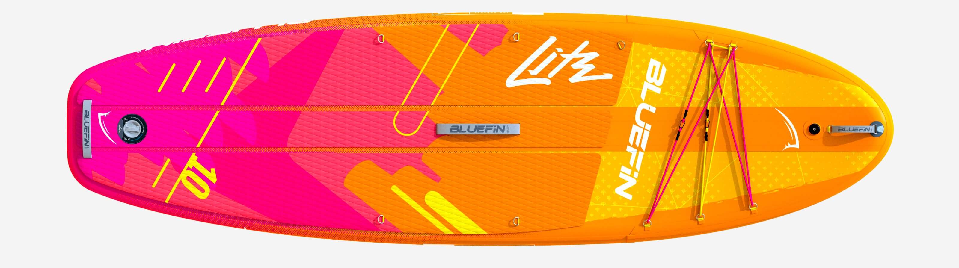 Inflatable paddleboard with vibrant pink and orange design, textured deck pad, and center fin