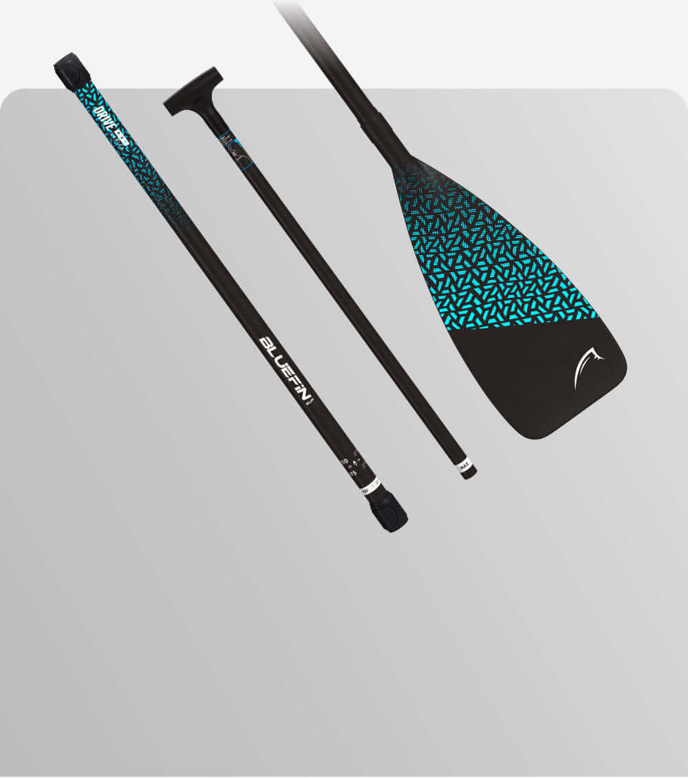 Three-piece paddle with black shaft and turquoise geometric design on the blade and grip